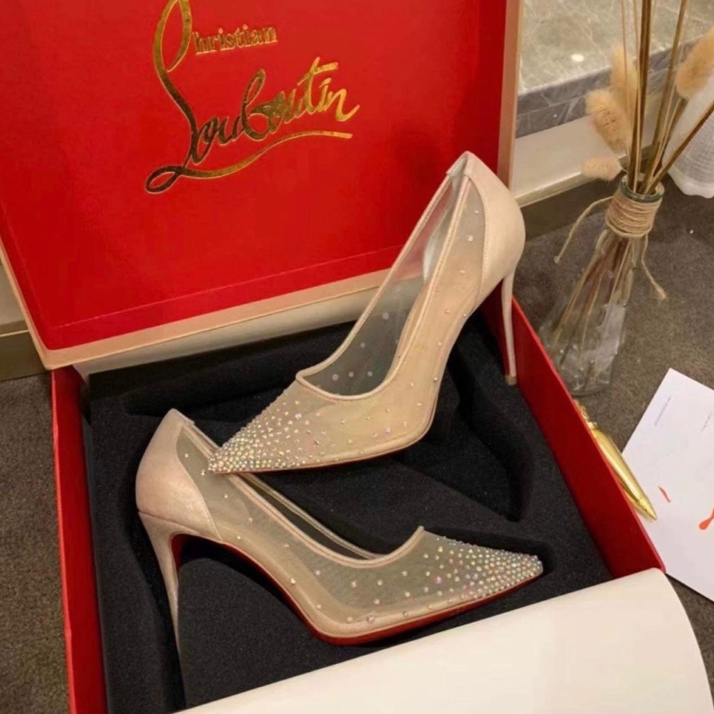 CHRISTIAN LOUBOUTIN
Follies 85 crystal-embellished mesh &glittered-leather pumps
